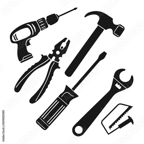 Black silhouettes of construction tools drill hammer