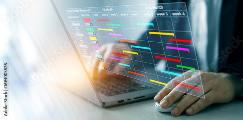 Project manager updating tasks and milestones progress planning with calendar interface for company.Business Project Management System.