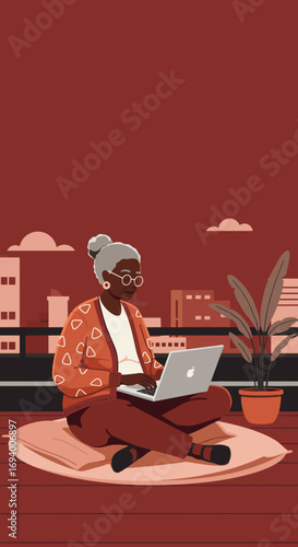 An engaged senior woman using a laptop on a city balcony, highlighting technology adoption and remote work for older adults.