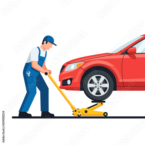 A mechanic in blue overalls using a jack to lift a red car's front tire for maintenance.