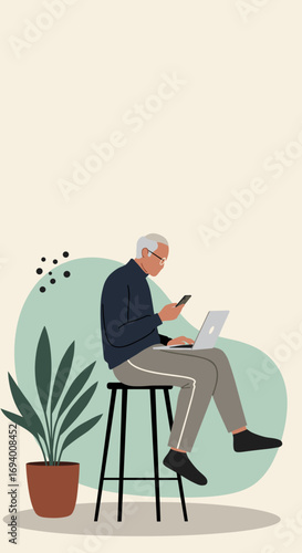 Senior man actively uses laptop and smartphone, illustrating digital literacy and connectivity in a modern, minimalist setting. Concept of elderly embracing technology.