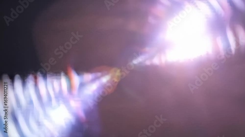 Blurred Circular Light Patterns Evolving into a Tunnel Effect with Dynamic And Colorful