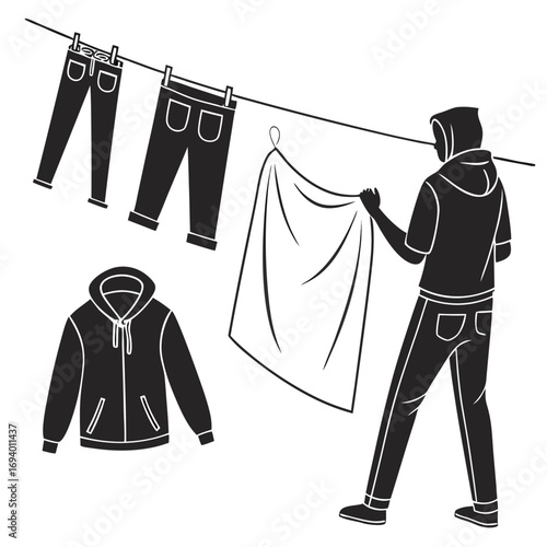 Person hanging clothes on clothesline laundry jeans