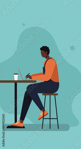 An African American man works remotely on his laptop at a cafe table, focusing on creative tasks or studies. Ideal for concepts of productivity, freelance work, and modern lifestyle.