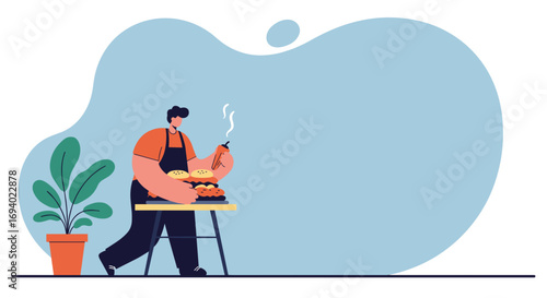 Man in apron preparing fresh, sizzling burgers and hot dogs on a counter. Ideal for home cooking, casual dining, food service, or summer picnic concepts.