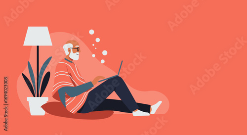 Content senior man uses his laptop comfortably at home. Represents modern aging, digital literacy, remote work, and a relaxed lifestyle.