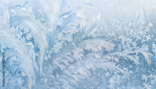 Winter wonderland with firefly effects and intricate ice frost on a frozen window