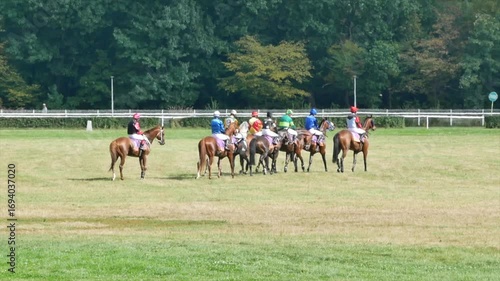 Wroclaw, Poland - September 7, 2025 Video of a group of jockeys riding horses and checking the racetrack before a horse racing competition in Wroclaw, Poland.