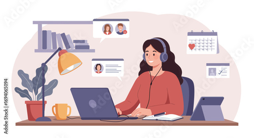 Young woman with headphones working on a laptop at her desk.