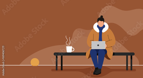 Person in warm winter coat works on laptop outdoors with a hot drink. Concept of remote work, freelancing, and cozy lifestyle.