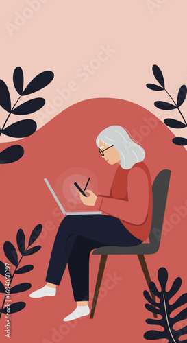 Senior woman engaged with modern technology, multitasking between a laptop and smartphone in a relaxed setting. Represents digital literacy and connection for older adults.