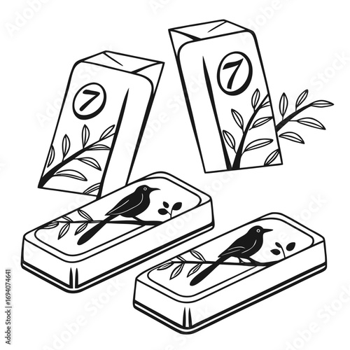 Black birds and floral motifs on soap packaging bars