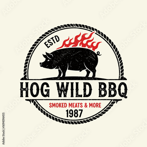 A vintage-style logo featuring a black pig with flames, text, and a rope border.