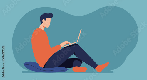 Man sitting casually on a cushion, focused on his laptop, ideal for remote work, online learning, or a modern digital lifestyle.