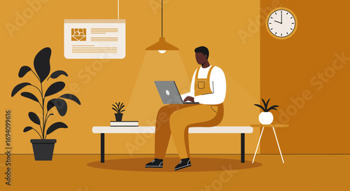 Focused man working remotely on a laptop in a modern, minimalist home office. Represents productivity, digital work, freelance lifestyle, and business.