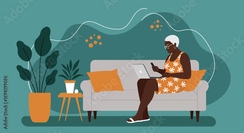 Senior Black woman relaxed on sofa, using laptop and phone. Represents modern connectivity, digital literacy, and comfortable home lifestyle.