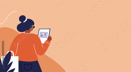 Modern woman enjoying music or browsing on her tablet while out shopping, representing digital lifestyle, leisure, and entertainment.