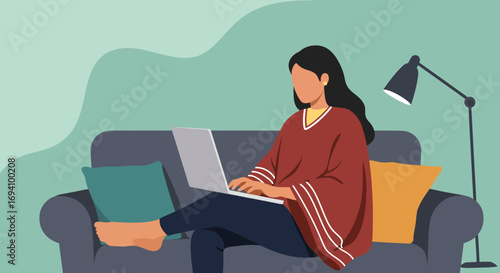 Young woman working remotely on her laptop from the comfort of her home, sitting casually on a sofa. Represents modern lifestyle, freelance, and online business.