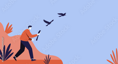 Man releases a bird into the vast blue sky, symbolizing freedom, hope, and connection with nature in an outdoor setting.