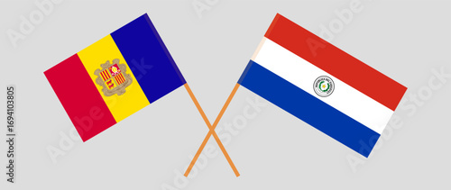 Crossed flags of Andorra and Republic of Paraguay. Official colors. Correct proportion. Vector illustration