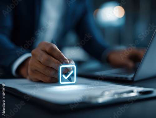 Signing electronic contract agreement with digital signature. Check mark icon. Technologies of contract authentication and certification system. Businessman using laptop computer at desk in office
