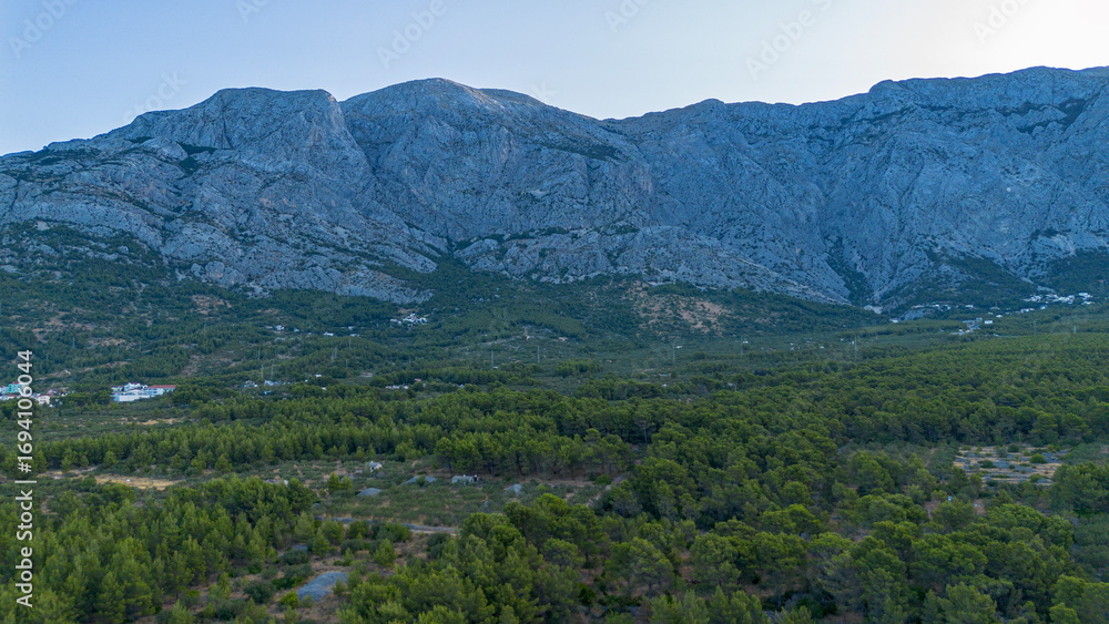 Obraz premium Biokovo mountain range and mountain valley by the Adriatic Sea. Croatia, Makarska