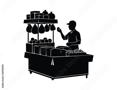 Silhouette of a street food vendor with a cart