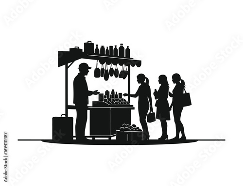 Silhouette of a street vendor selling goods to customers in the city