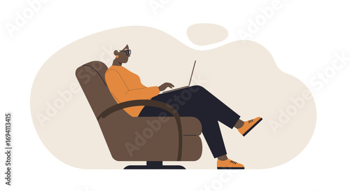 Elderly Black woman with glasses comfortably uses a laptop in an armchair, depicting remote work, online learning, or leisure. Represents modern senior engagement with technology.