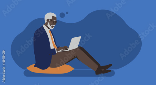 Senior African American man focused on his laptop, representing remote work, online learning, and modern digital lifestyle. Ideal for business and technology themes.