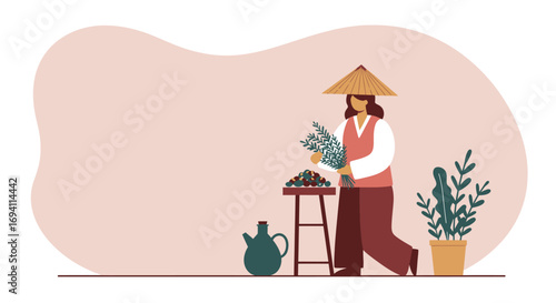 Woman in a traditional conical hat gathers fresh herbs, standing by a rustic stall with natural produce. Ideal for health, culture, or agricultural themes.