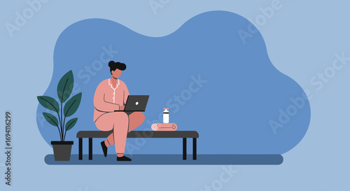 Comfortable woman in pajamas working from home on her laptop, embracing remote work flexibility and a relaxed lifestyle.