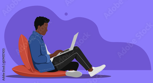 Focused young person works efficiently on a laptop in a relaxed, modern setting. Ideal for remote work, online learning, or digital lifestyle content.