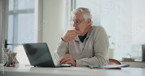 Wallpaper Mural Laptop, reading and thinking with business man at desk in office for planning, report or research. Computer, concentration and typing with mature employee in for administration or management Torontodigital.ca