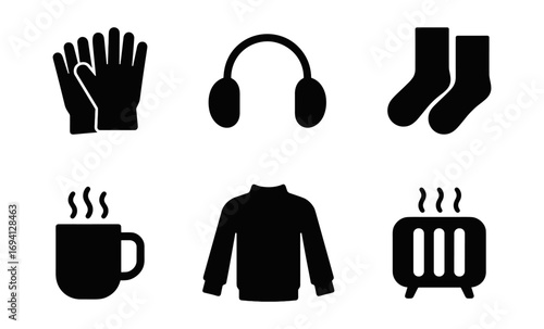Winter essentials icons: clothing and cozy accessories in black silhouette style