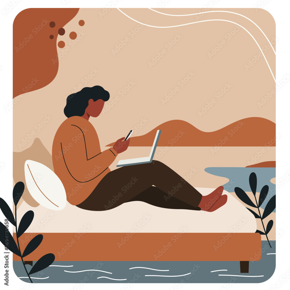 Fototapeta premium Focused individual multi-tasking on laptop and smartphone from a comfortable bed or lounge, embodying modern remote work and digital lifestyle.