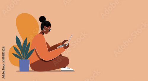 Young woman working remotely on laptop from home, sitting comfortably with a plant. Represents modern lifestyle, freelance work, and online education.