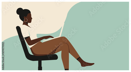 Focused Black woman working remotely on laptop from a comfortable chair. Represents freelance work, online education, and modern digital lifestyle.