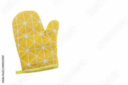 a yellow oven mitt on the left sight, designed for kitchen safety, cooking, a baking protection, from hot pots, pans, and oven trays, yellow essential kitchen accessory, isolated on white background 