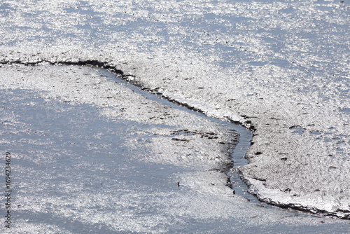 Schlick im Watt bei Ebbe, Deutschland