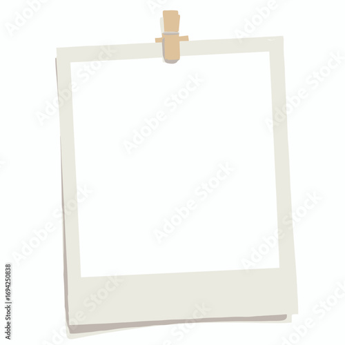 Polaroid photo placeholder: square image area with thick white border, handwritten caption line and paperclip on white background