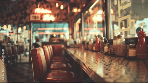 Vintage film-style photo of a classic diner scene, faded colors and film grain effect, warm nostalgic atmosphere