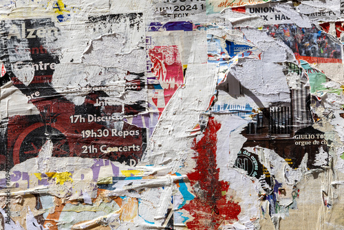 Wallpaper Mural Affiches déchirées dans les rues de de Foix dans les Pyrénées en France Torontodigital.ca