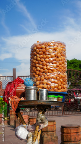 Street Food Stall with Stack of Golgappa Paani Puri in India