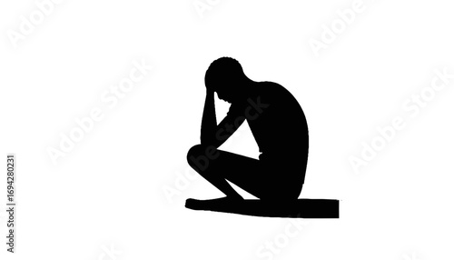 Silhouette of a Person in Despair or Deep Thought