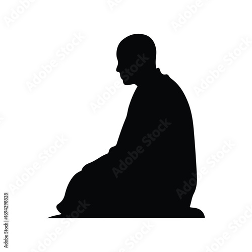Silhouette of man sitting calmly, suitable for meditation, rest and peace concepts.