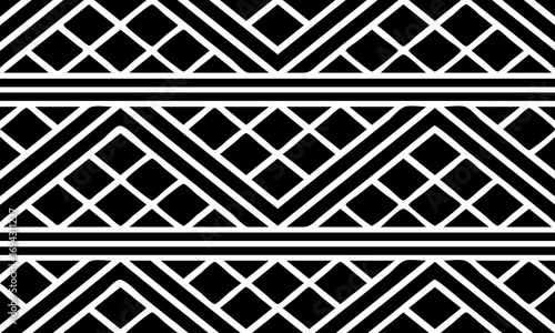Black and white geometric tribal pattern. The repeating diamond and triangle shapes.