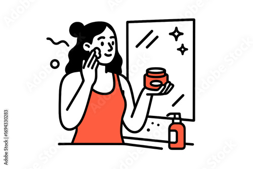 Woman applying moisturizing face cream in front of a mirror as part of her daily skincare routine for healthy skin