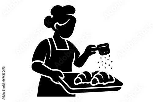 Baker woman sprinkling powdered sugar on fresh croissants on a baking tray black and white glyph icon
