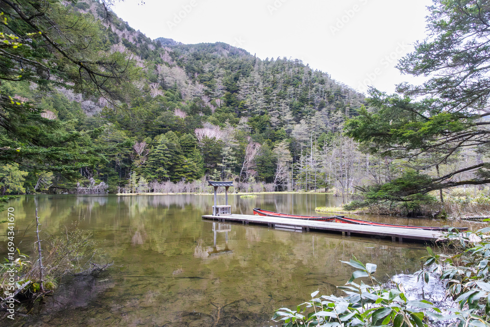 Fototapeta premium Myojin pond in Kamikochi Central Japan is an idyllic and scenic spot and popular tourist destination.